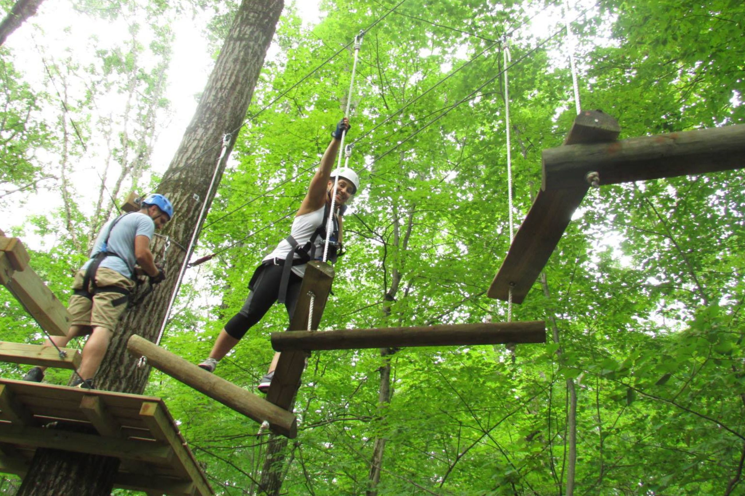 High Ropes Course New York people on a treetop challenge course near Albany, NY